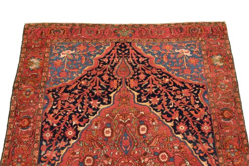 Surface texture of 1900s Malayer rug with natural Wool and intricate pattern