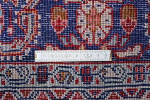 Corner detail of 2000s Malayer rug showing border pattern and Wool pile