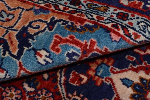Close-up detail of 2000s Malayer rug from Iran / Persia showing Wool weave