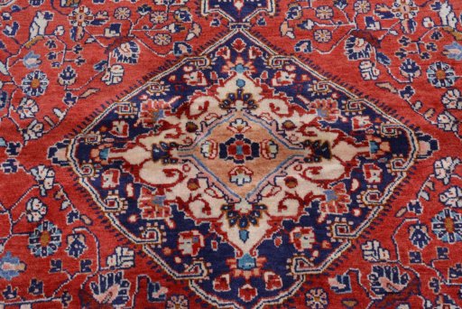 Backside of handmade 2000s Malayer rug showing knot structure and weave density