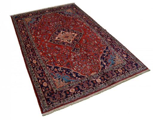 Close-up detail of 2000s Malayer rug from Iran / Persia showing Wool weave