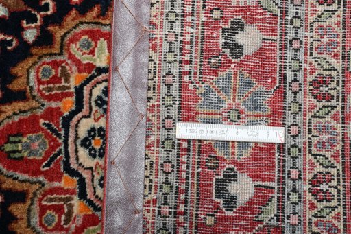 Surface texture of 1970s Malayer rug with natural Wool and intricate pattern