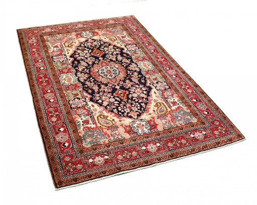 Corner detail of 1970s Malayer rug showing border pattern and Wool pile