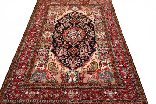 Surface texture of 1970s Malayer rug with natural Wool and intricate pattern