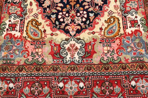 Backside of handmade 1970s Malayer rug showing knot structure and weave density