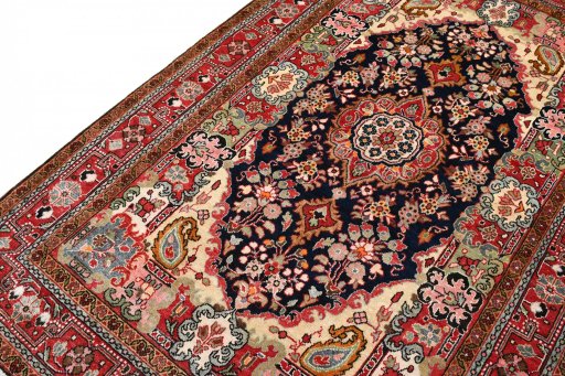 Close-up detail of 1970s Malayer rug from Iran / Persia showing Wool weave