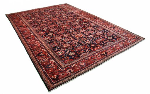 Corner detail of 2000s Malayer rug showing border pattern and Wool pile
