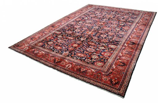 Close-up detail of 2000s Malayer rug from Iran / Persia showing Wool weave