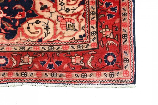 Backside of handmade 2000s Malayer rug showing knot structure and weave density