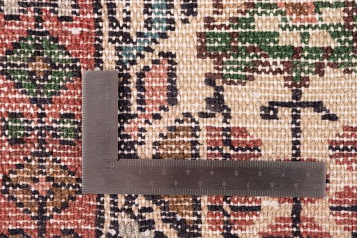 Corner detail of 1974s Malayer rug showing border pattern and Wool pile