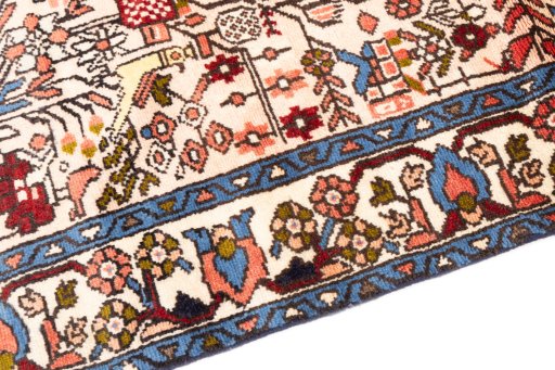 Backside of handmade 1974s Malayer rug showing knot structure and weave density