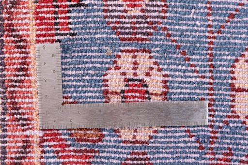 Corner detail of 1999s Malayer rug showing border pattern and Wool pile