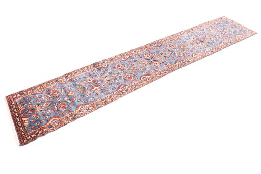 Corner detail of 1999s Malayer rug showing border pattern and Wool pile