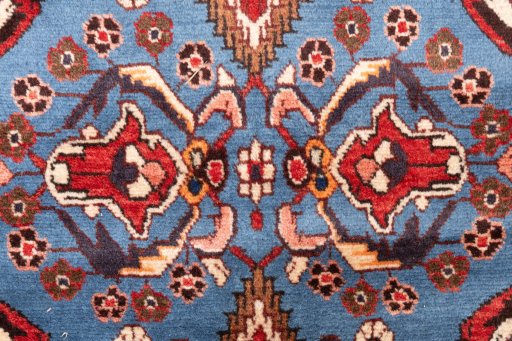 Full view of 1999s Malayer rug from Iran / Persia, 404 × 75 cm in Dark blue tones