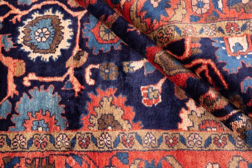 Corner detail of 1979s Malayer rug showing border pattern and Wool pile