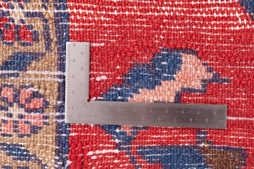 Close-up detail of 1979s Malayer rug from Iran / Persia showing Wool weave