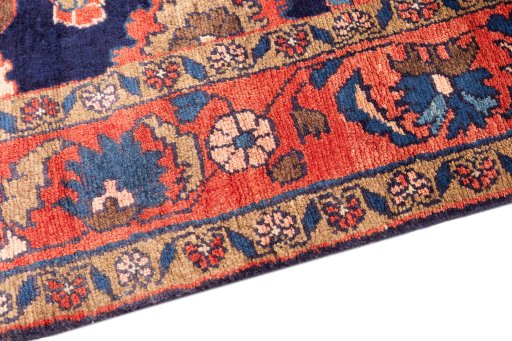 Backside of handmade 1979s Malayer rug showing knot structure and weave density