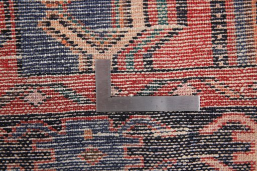 Corner detail of 1980s Malayer rug showing border pattern and Wool pile