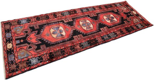 Close-up detail of 1980s Malayer rug from Iran / Persia showing Wool weave