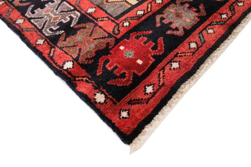 Central medallion detail of 1980s Malayer rug from Iran / Persia