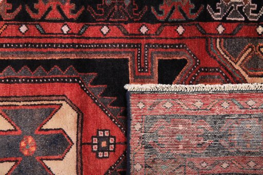 Close-up detail of 1980s Malayer rug from Iran / Persia showing Wool weave