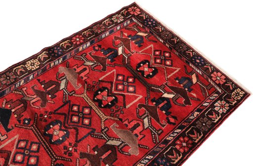 Surface texture of 1980s Malayer rug with natural Wool and intricate pattern
