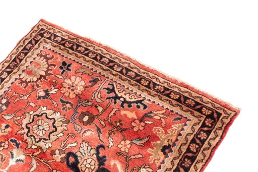 Surface texture of 1972s Malayer rug with natural Wool and intricate pattern