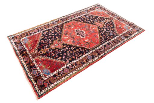 Corner detail of 1975s Malayer rug showing border pattern and Wool pile