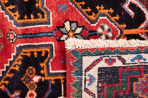 Close-up detail of 1975s Malayer rug from Iran / Persia showing Wool weave