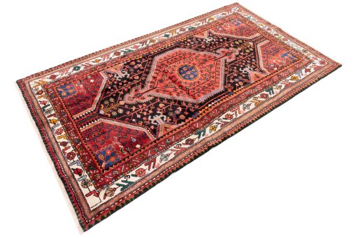 Corner detail of 1975s Malayer rug showing border pattern and Wool pile