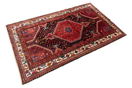 Close-up detail of 1975s Malayer rug from Iran / Persia showing Wool weave
