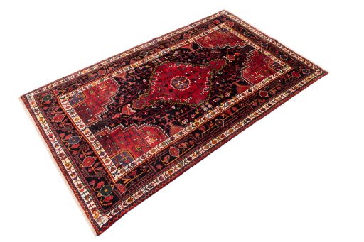 Close-up detail of 1982s Malayer rug from Iran / Persia showing Wool weave