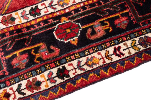 Backside of handmade 1982s Malayer rug showing knot structure and weave density