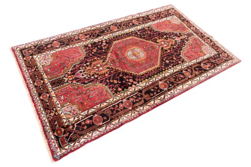 Corner detail of 1978s Malayer rug showing border pattern and Wool pile