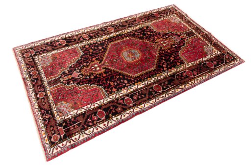 Close-up detail of 1978s Malayer rug from Iran / Persia showing Wool weave