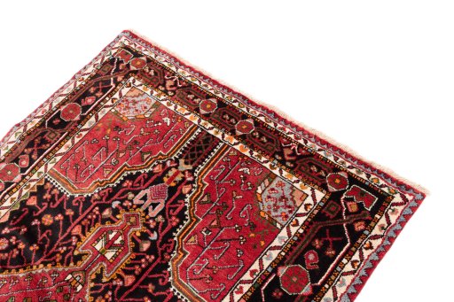 Surface texture of 1978s Malayer rug with natural Wool and intricate pattern