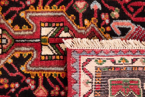 Close-up detail of 1978s Malayer rug from Iran / Persia showing Wool weave