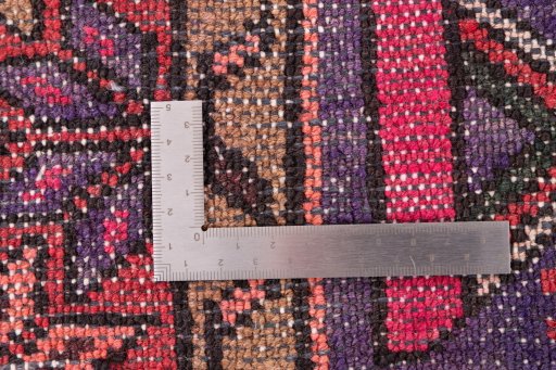 Close-up detail of 1975s Malayer rug from Iran / Persia showing Wool weave