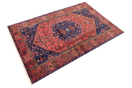 Corner detail of 1975s Malayer rug showing border pattern and Wool pile