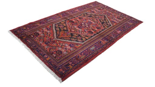 Close-up detail of New Malayer rug from Iran / Persia showing Wool weave