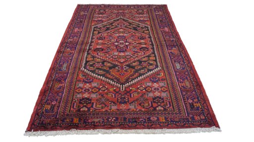 Close-up detail of New Malayer rug from Iran / Persia showing Wool weave