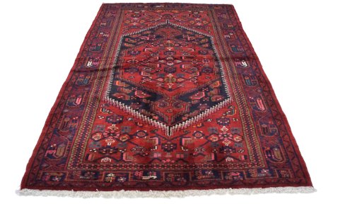 Close-up detail of New Malayer rug from Iran / Persia showing Wool weave