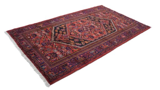 Close-up detail of New Malayer rug from Iran / Persia showing Wool weave