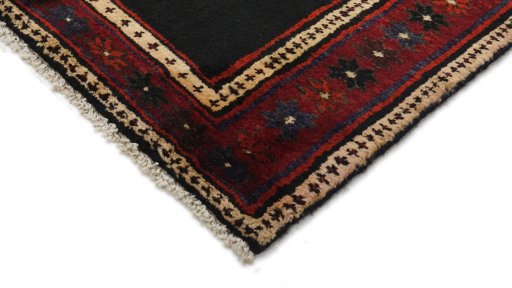 Backside of handmade 1990s Malayer rug showing knot structure and weave density