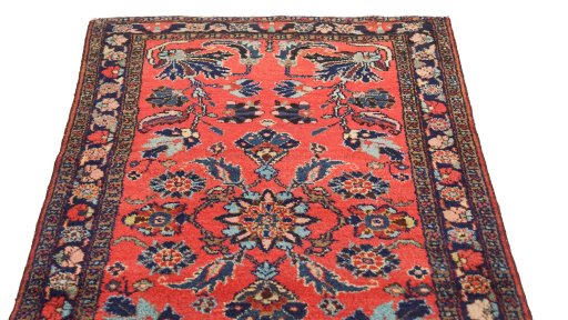 Surface texture of 1940s Mehraban rug with natural Wool and intricate pattern