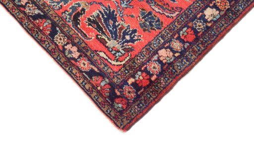 Backside of handmade 1940s Mehraban rug showing knot structure and weave density