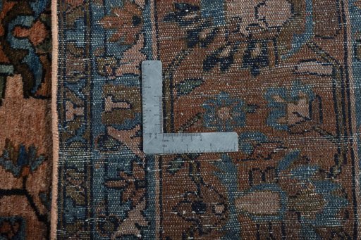 Backside of handmade 1930s Mehraban rug showing knot structure and weave density