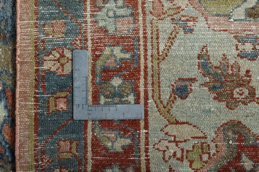 Backside of handmade 1930s Mehraban rug showing knot structure and weave density