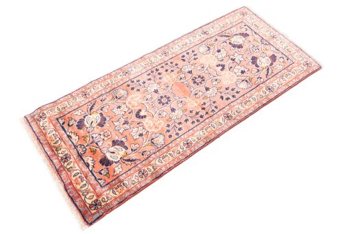 Corner detail of 1949s Mehraban rug showing border pattern and Wool pile