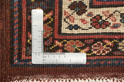 Close-up detail of 1930s Meshkin rug from Iran / Persia showing Wool weave